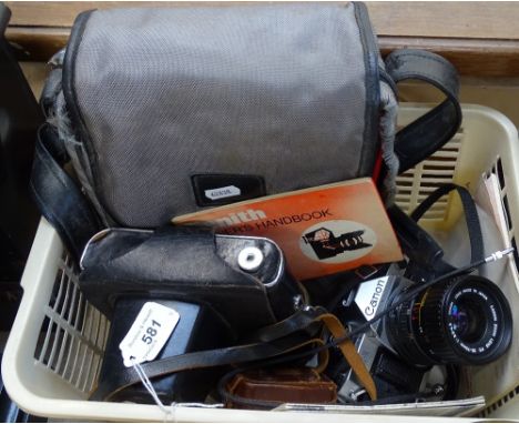 A Canon AE2 35MM camera, lenses and accessories, and a Russian Zenit 35MM camera 