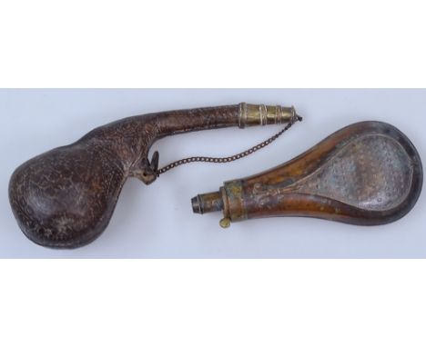 An Antique embossed copper shot flask, 7.5", and a tooled leather powder flask 
