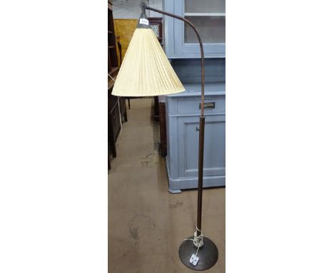 A mid-century copper telescopic arch lamp and shade 