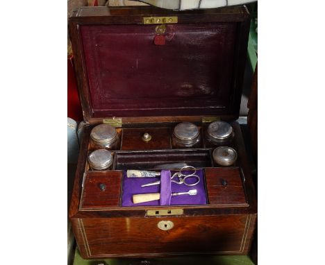 An Antique mother-of-pearl inlaid box with tray fitted interior, original glass bottle with plated mounts, scent flask etc, l