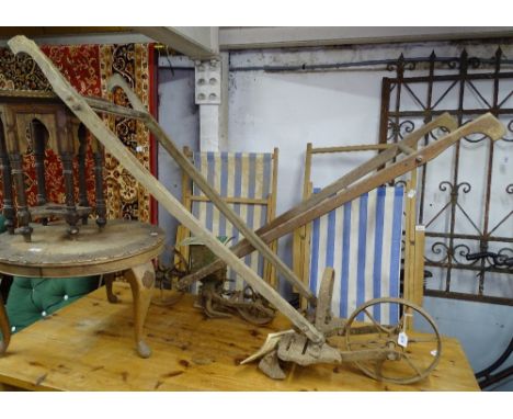 2 Vintage ploughs 