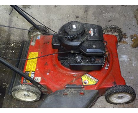 A Yard King petrol rotary lawn mower 