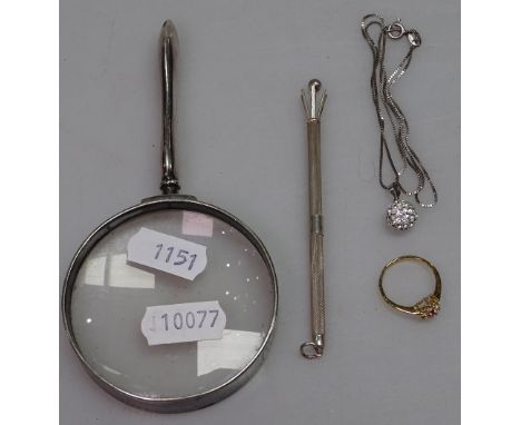 A silver-handled magnifying glass, Birmingham 1926, a silver swivel stick, a silver pendant and chain, and a dress ring 