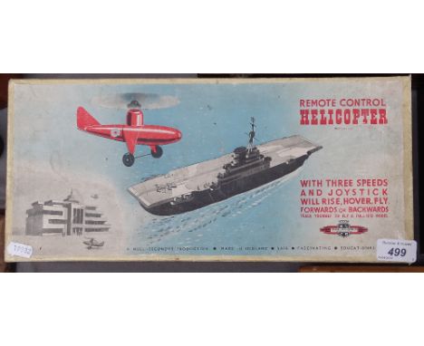 A Vintage remote control helicopter by Nulli Secundus, boxed with instructions 
