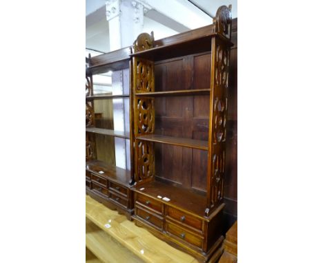 A reproduction hardwood hanging open book shelf, with 4 short drawers, W51cm 