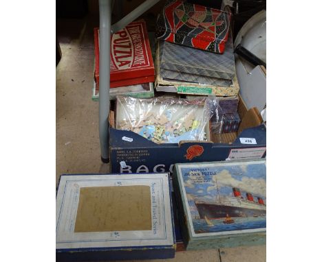 A group of Vintage board games and puzzles 