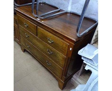 An oak chest of 2 short and 2 long drawers, bracket feet, W109cm 