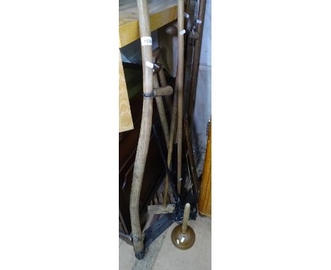 A collection of Vintage long-handled tools, including scythe, spades, rack, washing dollies etc 