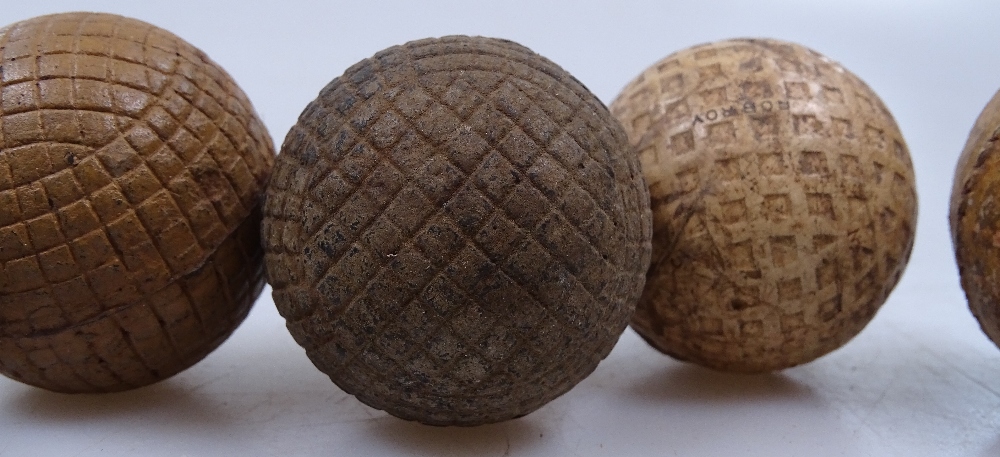 5 Antique golf balls