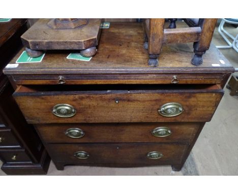 A George III mahogany batchelor's chest, with brushing slide and 3 drawers under, bracket feet, W77cm 