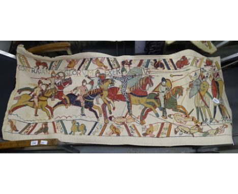 A machined needlework panel depicting the Bayeux Tapestry, L150cm 