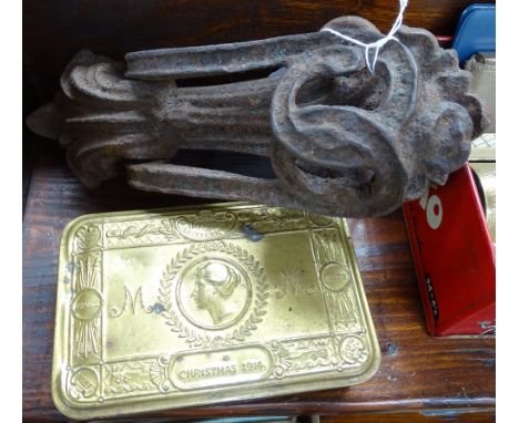 A Victorian cast-iron door knocker, and a 1914 Queen Mary Christmas tin 