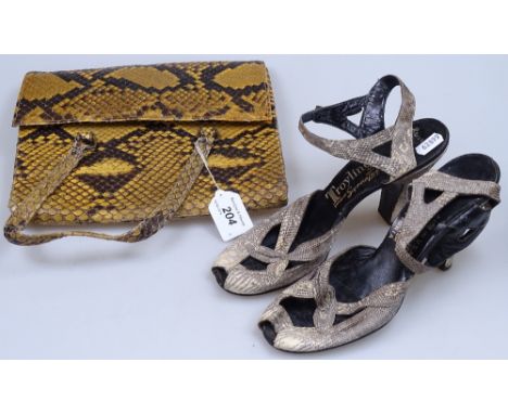 A cobra skin handbag, 10" across, and a pair of Vintage snakeskin shoes 