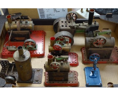 A group of live steam powered stationary engines, a traction engine (7) 