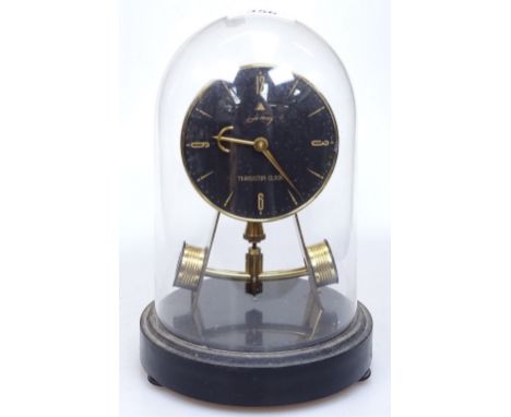 A Vintage Honey transistor clock under glass dome, height 8.5" 
