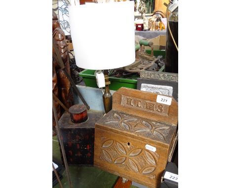 A carved Alms box, a metal caddy, and a table lamp, height 18.5" 
