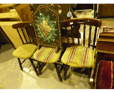 Three chairs and a fire screen