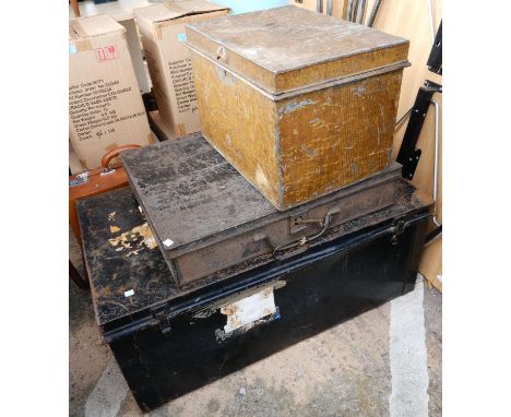 A large metal tin trunk, two smaller and two cases.