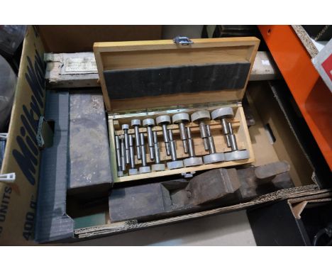 A selection of vintage tools including a spirit level, plane, etc.