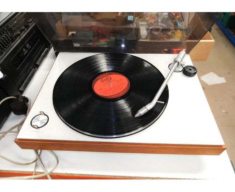 A vintage Bang and Olufsen Beogram 1203 record deck and a Sony ghetto blaster.