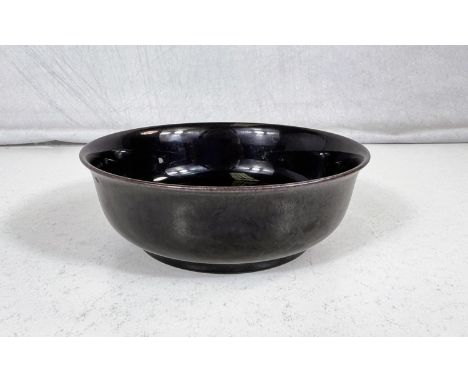 A small Chinese monochrome bowl with impressed seal mark to the base, diameter 11cm