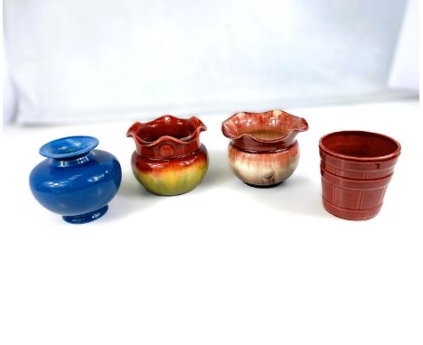 Bretby Art Pottery: - A squat vase with folded rim, red/green glaze, rim pierced for hanging, diameter 12cm, unmarked (chip t