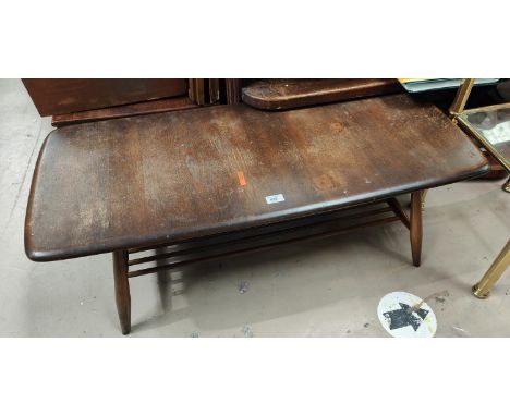 An Ercol elm two tier coffee table.