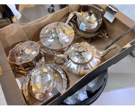 A silverplated kettle on burner stand and another silverplated kettle, a silver plated tureen, tea caddy and toast fork, cand