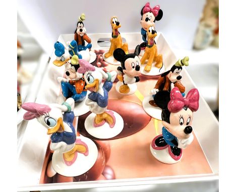 Eleven boxed Royal Doulton ceramic "Mickey Mouse" figures etc.