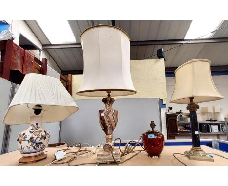 A Crown Devon 1930's red lustre table lamp; a marble table lamp and three others.