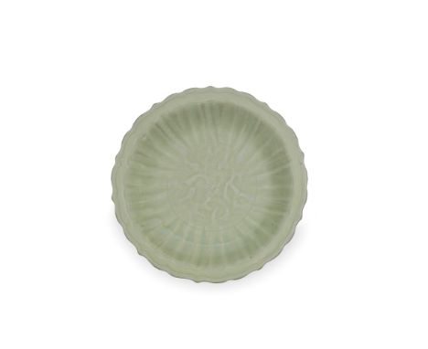 A LONGQUAN CELADON BARBED RIM DISHMing DynastyThickly potted with shallow fluted sides curving to a wide everted barbed rim, 