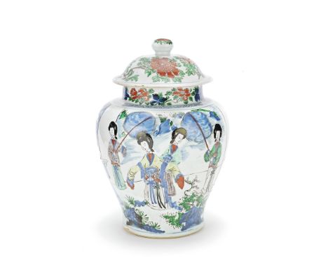 A LARGE WUCAI BALUSTER JAR AND COVERShunzhiDecorated with a lady in a long sleeved robe, her arms outstretched, amongst male 