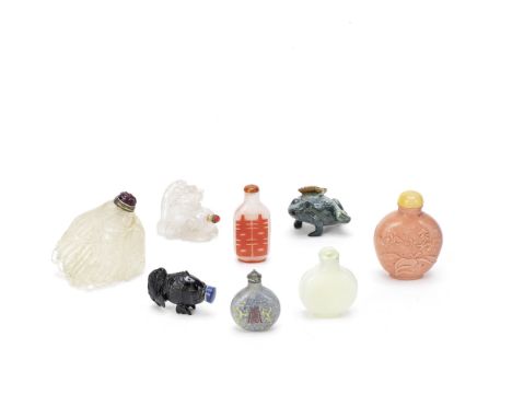 A GROUP OF EIGHT VARIOUS SNUFF BOTTLESQing Dynasty to 20th centuryComprising: a white jade 'horse' snuff bottle, agate stoppe