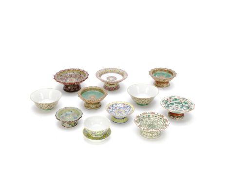 A GROUP OF ELEVEN BENCHARONG WARESChina for the Kingdom of Siam, 19th centuryComprising: eight porcelain stands with floral, 