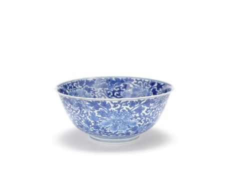 A BLUE AND WHITE 'PEONIES' BOWLKangxi six-character mark and of the periodFinely potted with rounded sides supported on a sho
