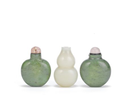 TWO SPINACH JADE SNUFF BOTTLES AND A PALE JADE DOUBLE-GOURD BOTTLE19th centuryThe spinach bottles of flattened rounded form w