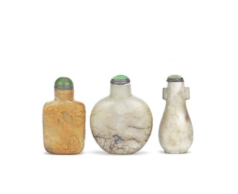 THREE VARIOUS JADE SNUFF BOTTLES19th centuryComprising: a mutton fat jade bottle, of flattened rounded form, the mottled crea
