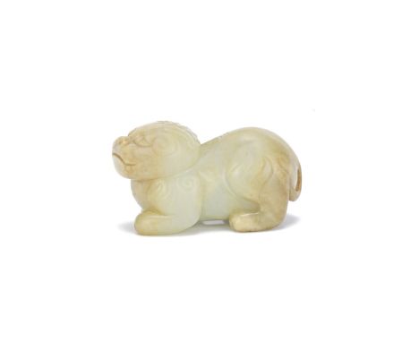 A CREAMY RUSSET JADE CARVING OF A BIXIEYuan/Early Ming DynastyThe recumbent beast facing forward with the head raised, the mo