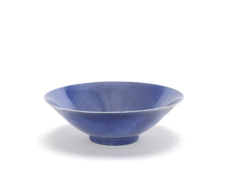 A POWDER BLUE-GLAZED BOWLKangxiRising from a tapering foot the deep flaring sides covered in a rich blue glaze, the rims and 
