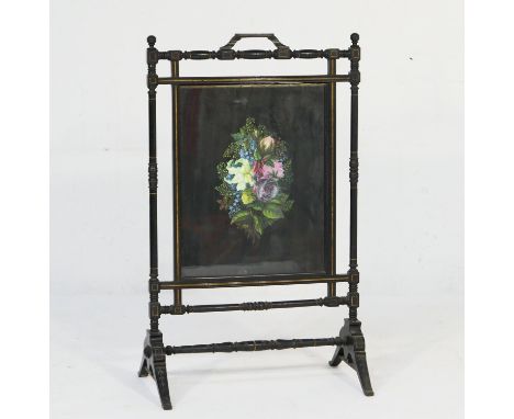 Victorian Aesthetic period ebonised firescreen, circa 1885, centred with a foliate painted fabric panel within turned gilt li