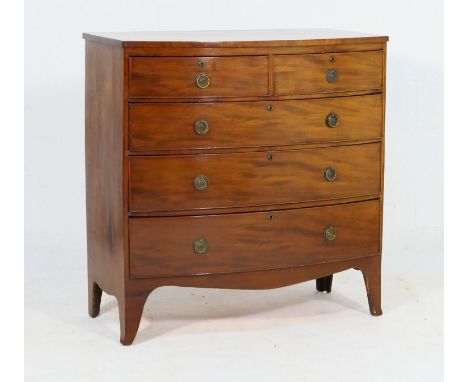 Mahogany bow front chest of drawers, 19th Century, fitted two short and three long graduated drawers with brass ring handles,