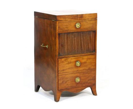 Regency mahogany gentleman's washstand, having a split folding top opening to reveal a pull-up mirror, the front having a sli