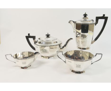 George V silver four piece tea service, by Walker &amp; Hall, Sheffield 1920/24, comprising lidded teapot and hot water jug, 