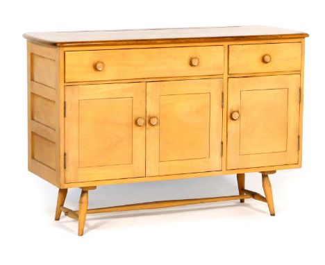 Ercol limed elm sideboard, early 1960s, fitted with one long and one short drawer, over three panelled doors opening to a sin