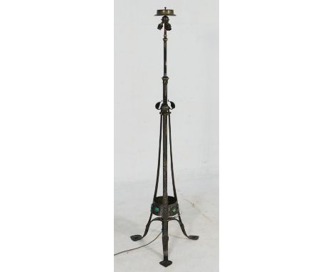 Arts and Crafts period wrought metal extendable standard lamp, circa 1905, with a three bulb fitting to the top over three tu