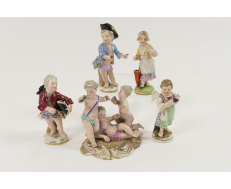 Meissen porcelain figure group, circa 1900, decorated with colours and heightened with gilt, underglaze blue crossed swords m