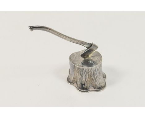 Modern silver desk ornament in the form of a woodcutter's axe resting in a tree stump, London 1984, 6.5cm 