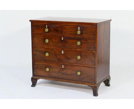 Late Regency mahogany chest of drawers, circa 1830, fitted with two short and three long graduated drawers, each with bone es