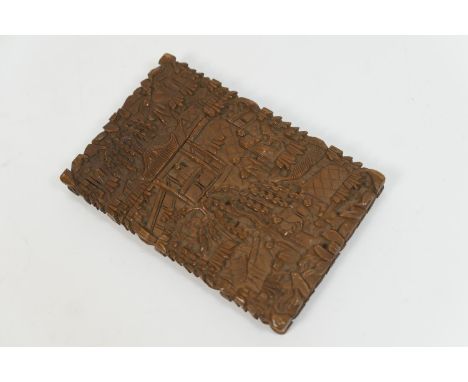 Cantonese carved sandalwood calling card case, late 19th Century, decorated in typical fashion with a myriad of figures, pavi