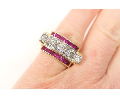 Belle Epoque diamond and ruby cluster ring, centred with five round brilliant cut diamonds dispersed with old mine cut diamon